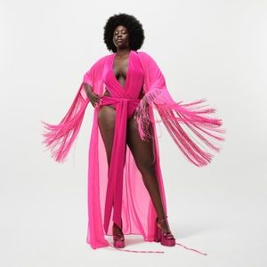 A CHIFFON ROBE WITH FRINGE, MADE IN PART WITH RECYCLED MATERIALS.